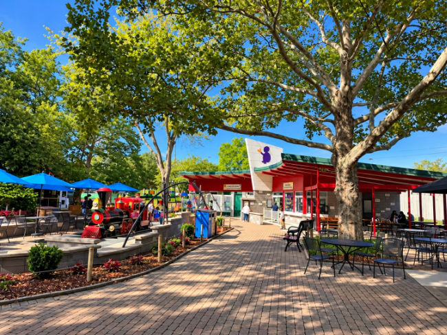 Shady picnic tables and lunch area at Saginaw Children's Zoo Michigan