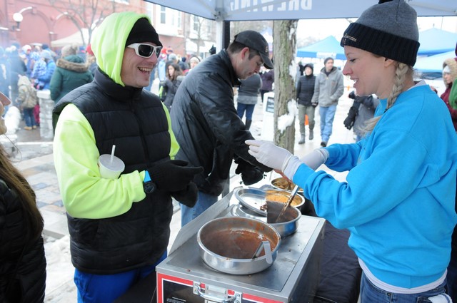 Ice Breaker Festival people serving and eating chili