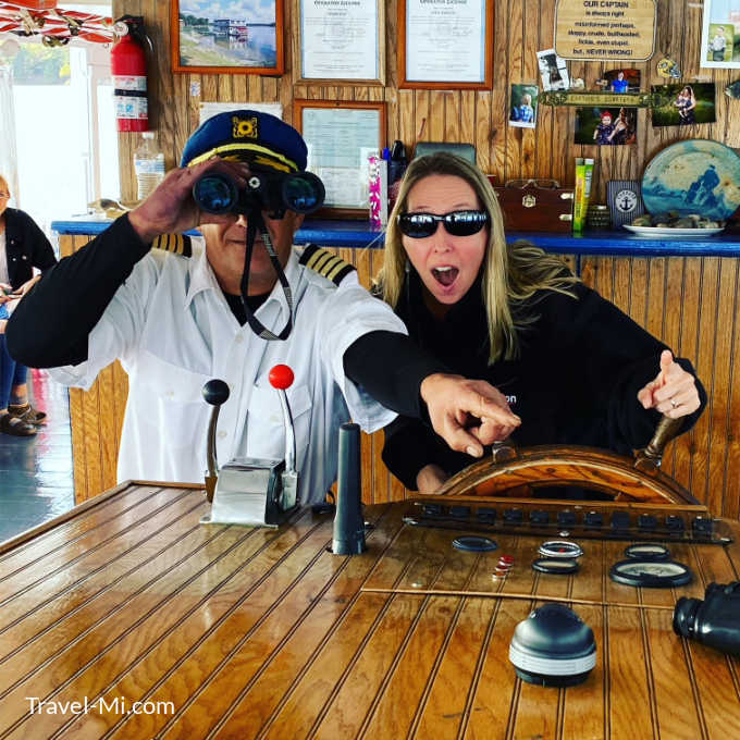 Sherry being silly with the captain of the boat