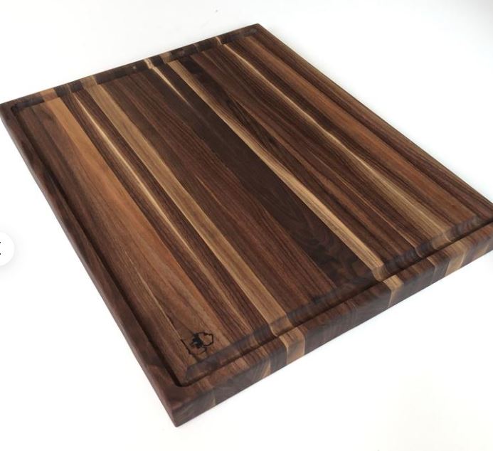 Reversible black walnut cutting board
