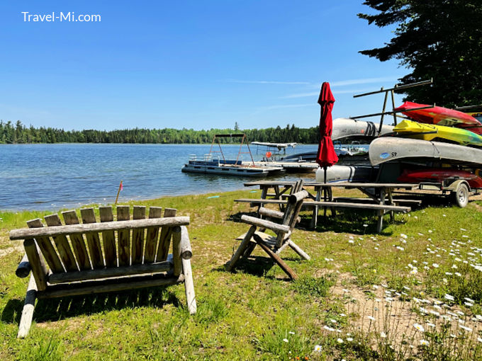 Seating at Camp Au Sable at the lake