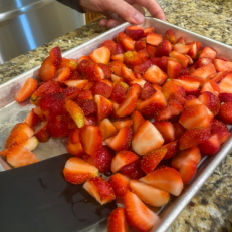 Removing frozen Strawberries from a pan