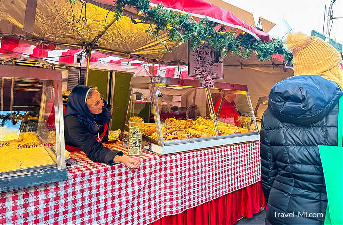 Kris Kringle Market - people shopping for Strudel and pastries