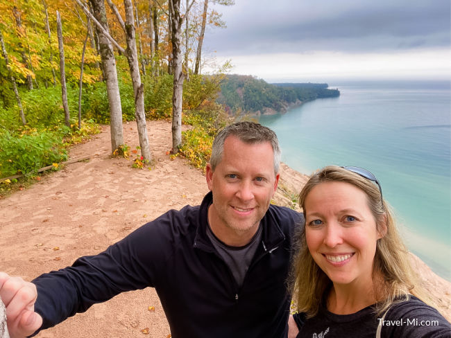 Chris and Sherry posing at the top of a sand dune