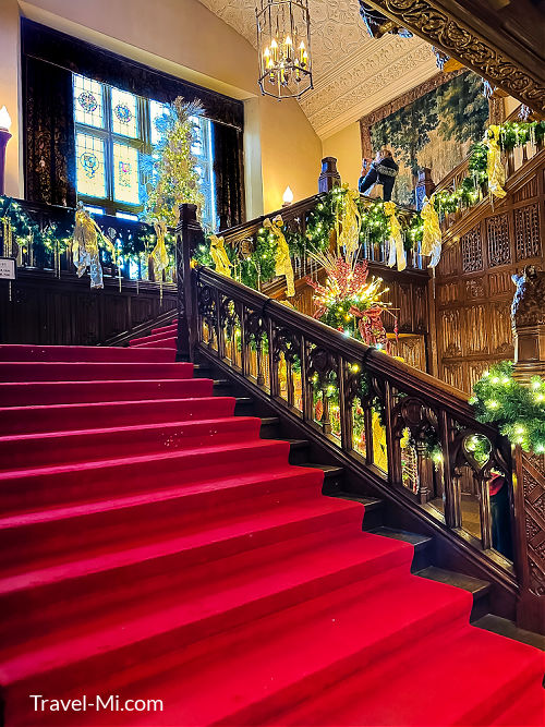Red carpeted staircase at Meadow Brook Hall