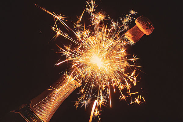 Wine bottle with sparklers on New Years