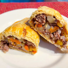 Pasty sitting on a plate