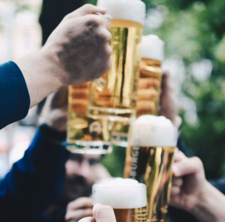 People toasting with beer