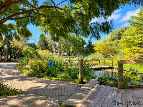 Scenic pond pathway and bridge at Saginaw Children's Zoo Michigan